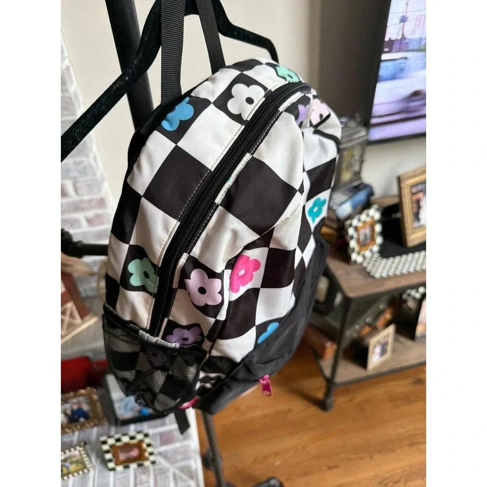 Claire's Checkered Daisy Small Backpack black-and-white checkerboard